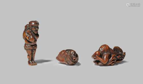 THREE JAPANESE WOOD NETSUKE EDO/MEIJI PERIODS One carved as Benkei in a large conch and blowing into