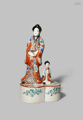 A RARE JAPANESE KAKIEMON FIGURAL GROUP C.1690 Depicting a beauty and a small child standing on a