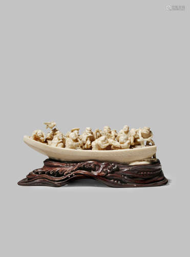 A JAPANESE IVORY OKIMONO MEIJI 1868-1912 Carved as a Treasure Boat, Takarabune, with some of the