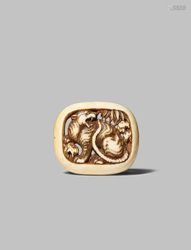 A JAPANESE IVORY RYUSA NETSUKE MEIJI 1868-1912 Square-shaped and with rounded corners, the centre