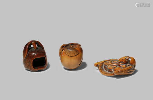 THREE JAPANESE NETSUKE EDO/MEIJI PERIODS Two carved as biwa fruits, one hollow and the other with