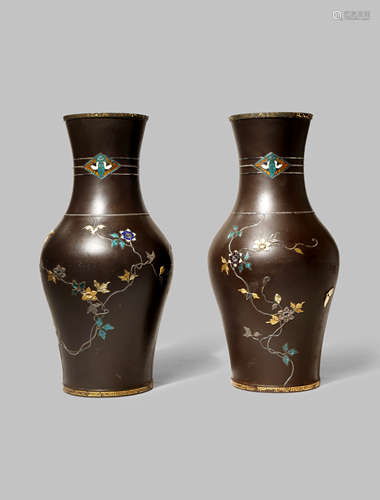 A GOOD PAIR OF JAPANESE SILVER AND ENAMEL IRON VASES MEIJI 1868-1912 Both finely decorated with