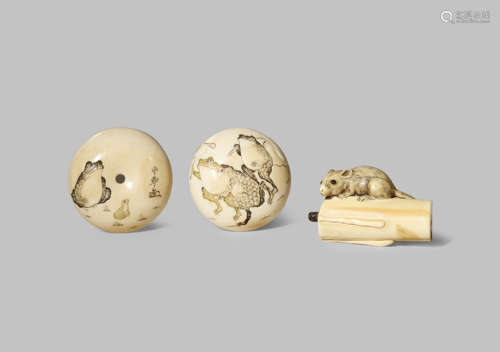 TWO JAPANESE IVORY NETSUKE MEIJI 1868-1912 One a manju, the front depicting three frogs in low