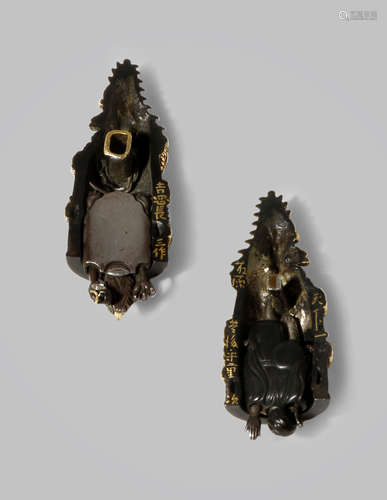 A PAIR OF ADAPTED SWORD FITTINGS, MENUKI EDO 1603-1868 The two pieces forming the bell from the