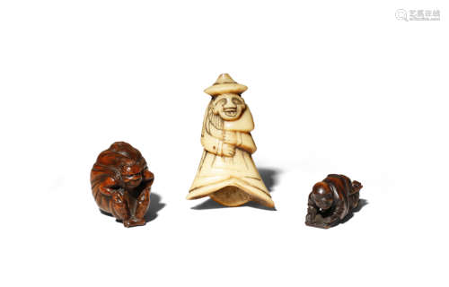 THREE JAPANESE NETSUKE EDO/MEIJI PERIODS Two in wood, one carved as an oni carrying a large sack