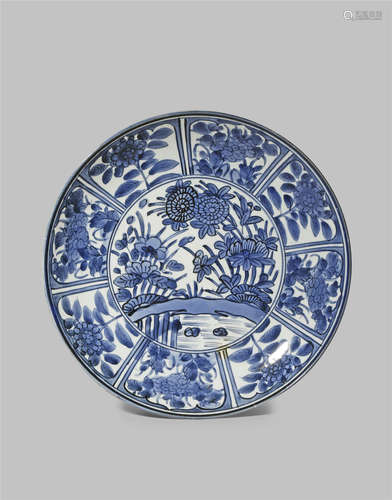 A LARGE JAPANESE ARITA BLUE AND WHITE DISH 18TH /19TH CENTURY Decorated with a central panel of