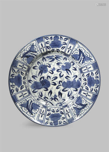 A MASSIVE JAPANESE ARITA BLUE AND WHITE DISH EDO 1603-1868 The rim typically painted with panels