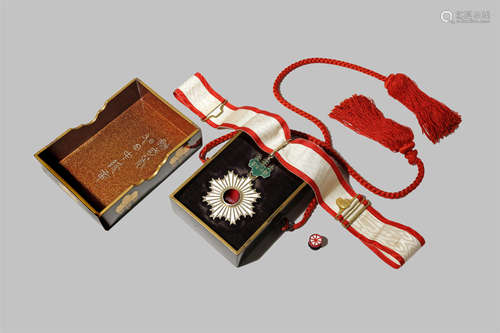 A JAPANESE ORDER OF THE RISING SUN MEDAL 20TH CENTURY For a III Class Commander, finely made in