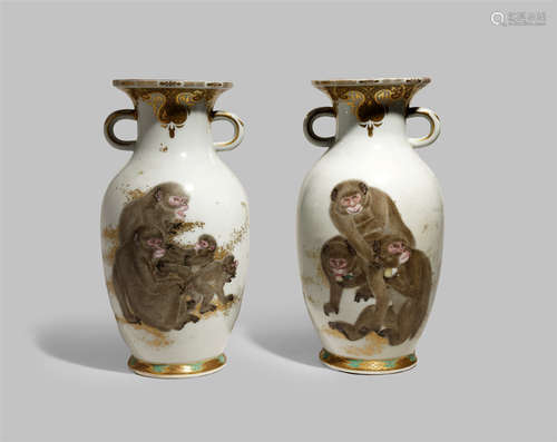 A PAIR OF JAPANESE VASES MEII 1868-1912 Each with a tall baluster body and loop handles to the neck,