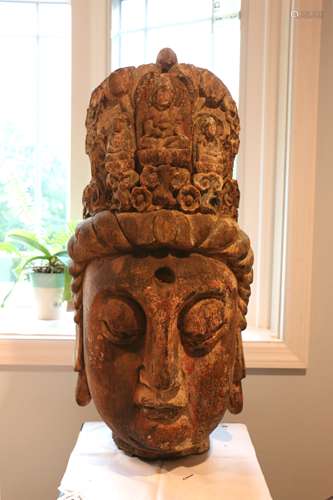 A Chinese Carved Wood Buddha’s Head