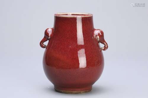 A Chinese Red Glazed Porcelain Vase with Double Ears