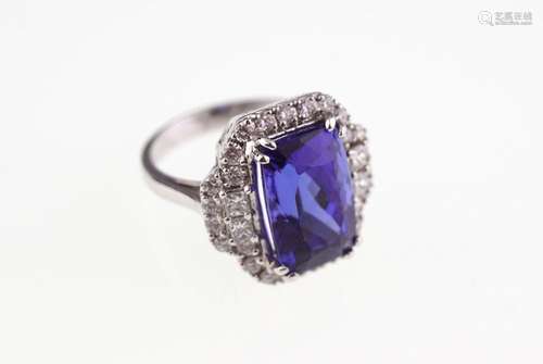 18 CT. WHITE GOLD 8.8 CT. TANZANITE AND 1.9 CT. DIAMOND CLUSTER RING