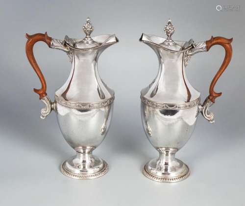 PAIR OF GEORGE III SHEFFIELD PLATED CRESTED CLARET JUGS