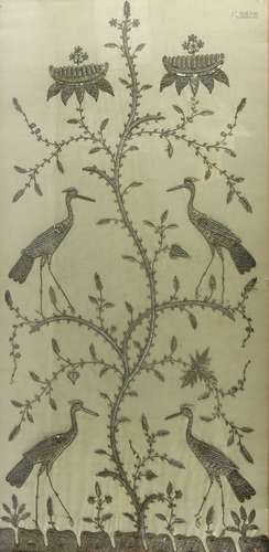 Eastern embroidery of four cranes on and amongst a flowering shrub, in silver coloured metallic