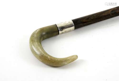 Early 20th century rhino horn handled and silver mounted walking stick, 86cm long,