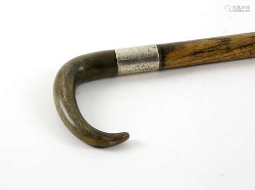 Early 20th century rhino horn handled and white metal mounted walking stick, 84cm long,