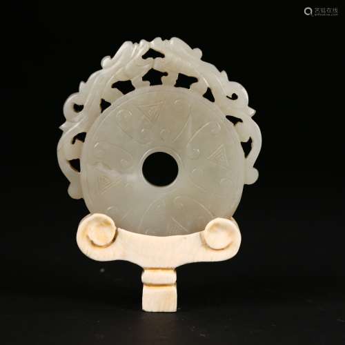 A Carved Hetian Jade Pendant on Bone Stand, Ming dynasty