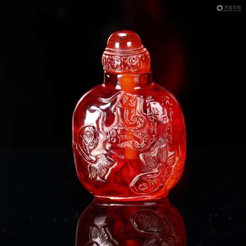 A Chinese Carved Amber Snuff Bottle.