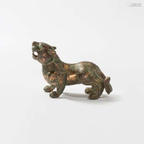 An important Chinese gilt-bronze figure of a tiger