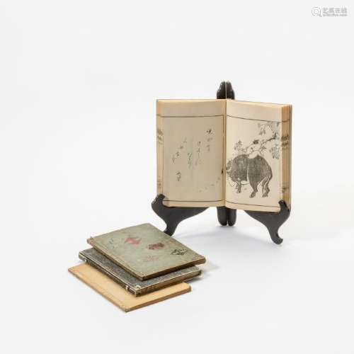 A collection of four Japanese illustrated books