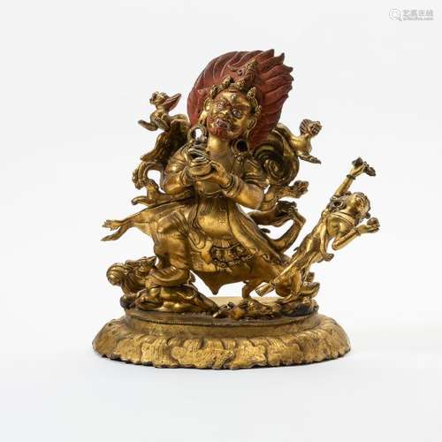 A large gilt and polychrome bronze figure of a tantric