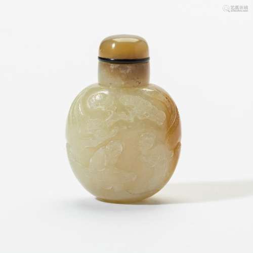 A Chinese celadon and russet jade snuff bottle