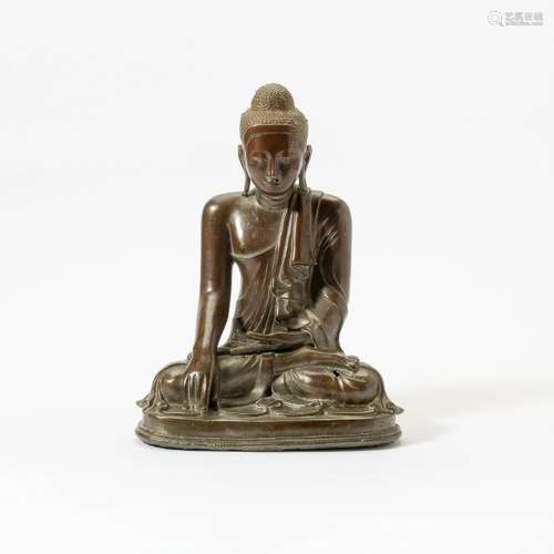 A Burmese Mandalay-style bronze figure of Buddha