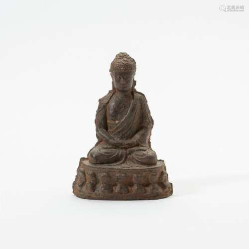 A Chinese iron figure of Buddha Shakyamuni
