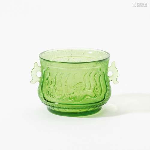 A Chinese green glass Islamic market vessel