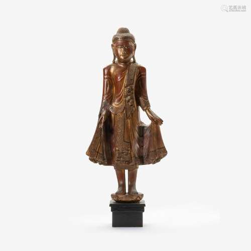 A Burmese Mandalay-style lacquered wood figure of