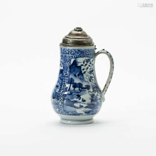 A Japanese Arita blue and white beer mug with metal