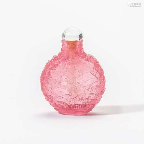 A Chinese carved pink glass 'dragon' snuff bottle