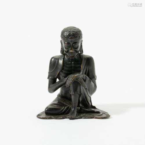 A rare Chinese bronze figure of the ascetic Buddha