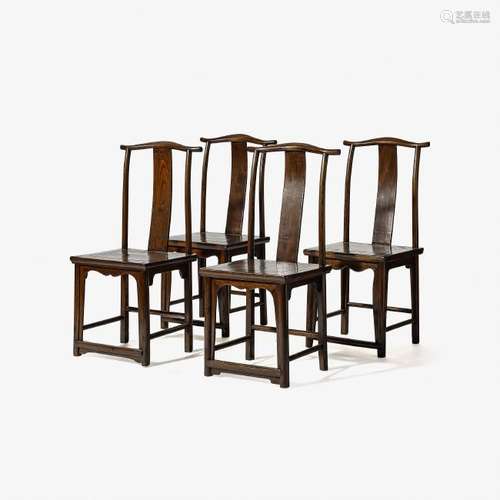 A set of four Chinese wooden 'official's hat' chairs