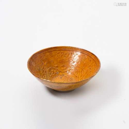 A Chinese amber-glazed moulded pottery bowl