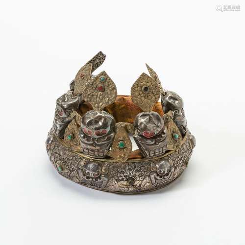 A Tibetan part-gilt metal oracle crown