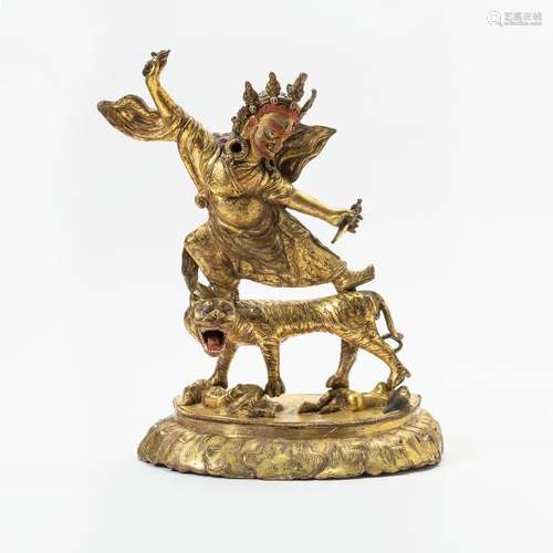 A large gilt and polychrome bronze figure of a tantric