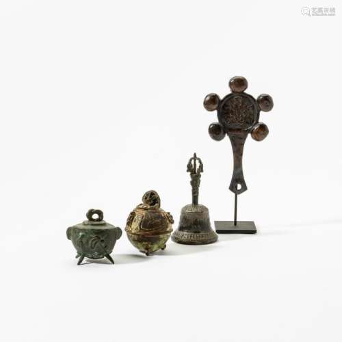 A collection of two bronze Chinese bells, a Chinese