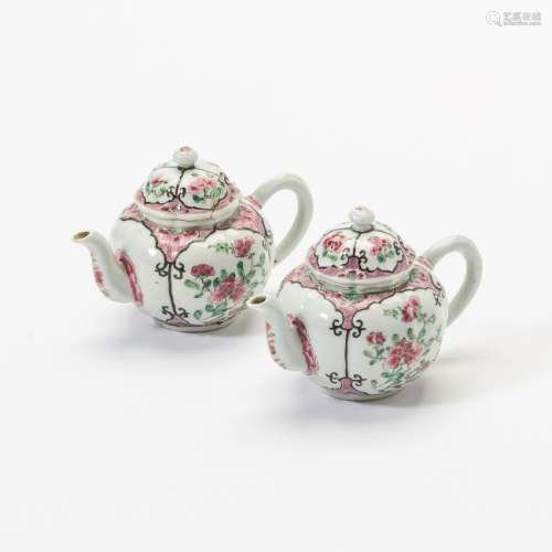 A pair of Chinese famille rose teapots with covers