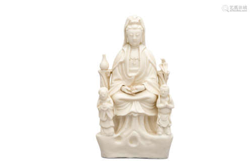 19th century A dehua white glazed figure group of Guanyin and attendants