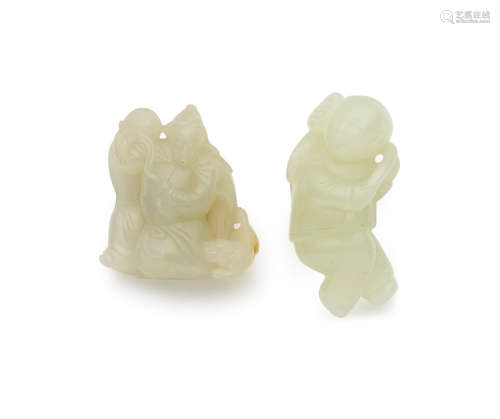 A pair of celadon jade figures