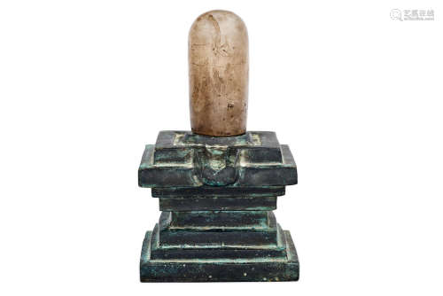 Possibly Angkhor period, 9th to 12th century A rock crystal Linga and bronze Yoni