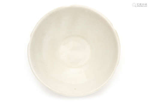 Late Tang to Five Dynasties A white glazed Dingyao 'flower head' shallow bowl