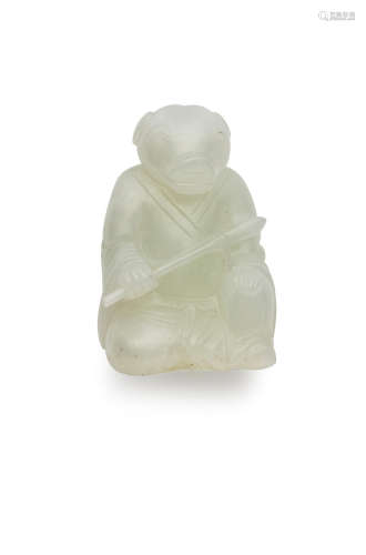 A white jade figure of a seated zodiac god
