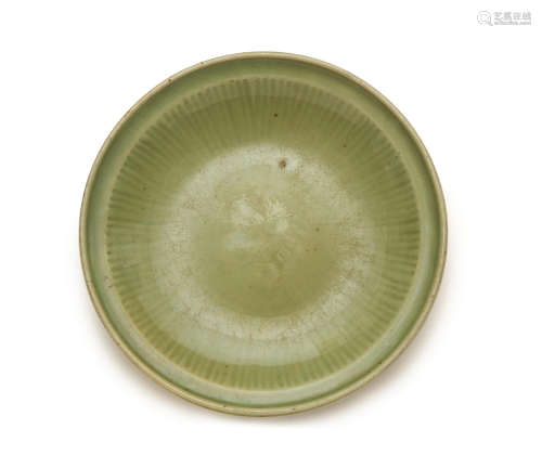 14th/15th century A longquan celadon glazed moulded 'floral' dish