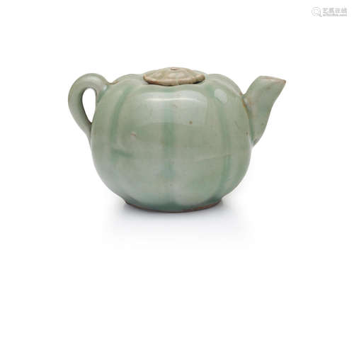 13th/14th century A Longquan celadon glazed melon-shape ewer