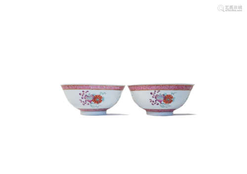 A pair of famille rose 'Buddhist emblems' bowls