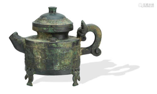 An archaistic bronze ritual pouring vessel and cover