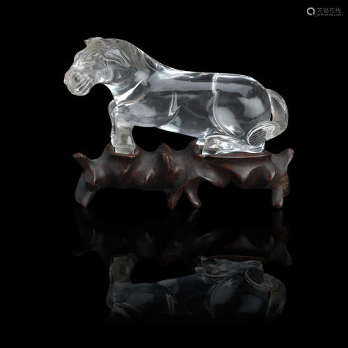 19th century A rock crystal horse and wooden stand