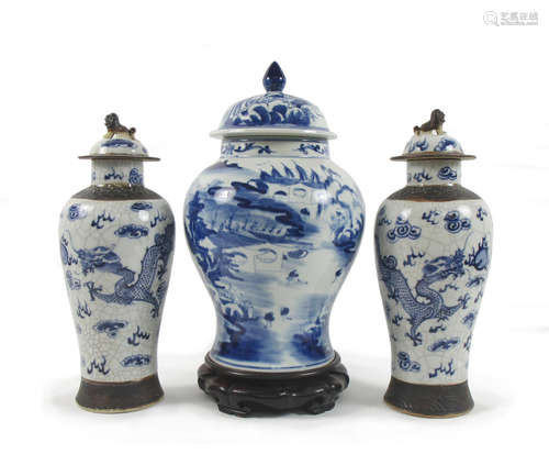 19th century A blue and white vase and cover, together with a pair of crackle ware vases and covers